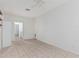Bright bedroom featuring tile floors, ceiling fan, and natural light at 408 N Falcon Ct, Gilbert, AZ 85234