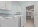 Convenient laundry room is equipped with modern washer and dryer at 408 N Falcon Ct, Gilbert, AZ 85234