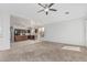 Open floor plan seamlessly connecting the kitchen and living room, perfect for entertaining at 408 N Falcon Ct, Gilbert, AZ 85234