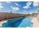 Backyard pool features a diving board at 408 N Falcon Ct, Gilbert, AZ 85234