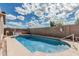 Backyard pool is surrounded by a spacious patio at 408 N Falcon Ct, Gilbert, AZ 85234
