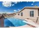 Backyard pool for your relaxation and enjoyment at 408 N Falcon Ct, Gilbert, AZ 85234