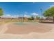 Community basketball court with new paint and equipment at 44574 W High Desert Trl, Maricopa, AZ 85139