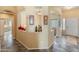 Inviting entryway with decorative niches, tile flooring, and an open layout, creating a seamless flow into the living spaces at 44574 W High Desert Trl, Maricopa, AZ 85139