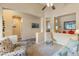 Well-lit living space with carpet, decorative niches, and an open layout, ideal for entertaining and relaxation at 44574 W High Desert Trl, Maricopa, AZ 85139