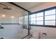 Modern bathroom highlighting a glass-enclosed shower, subway tile, and sleek fixtures at 4502 N 17Th Ave, Phoenix, AZ 85015