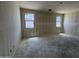 Unfinished bedroom with drywall, two windows ready for personalization at 46887 W Old Timer Rd, Maricopa, AZ 85139