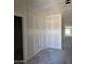 Unfinished hallway featuring drywall and open doorways at 46887 W Old Timer Rd, Maricopa, AZ 85139