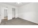 Bedroom featuring plush carpeting, ceiling fan, and large closet for storage solutions at 4723 W Samantha Way, Laveen, AZ 85339