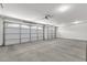 Large two car garage with updated lighting and a clean floor at 4723 W Samantha Way, Laveen, AZ 85339