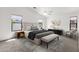 Spacious bedroom with a large window and a ceiling fan and neutral-toned decor at 4723 W Samantha Way, Laveen, AZ 85339