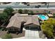 Aerial view of home showcasing tile roof, desert landscape and nearby mountains at 5543 W Kowalsky Ln, Laveen, AZ 85339