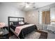 Cozy bedroom with a plush rug, stylish decor, and comfortable bedding, creating a welcoming space at 5543 W Kowalsky Ln, Laveen, AZ 85339
