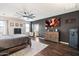 Stylish main bedroom with hardwood floors and a modern ceiling fan at 5543 W Kowalsky Ln, Laveen, AZ 85339