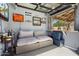 Entertaining pool house featuring a bar, comfortable seating, and vintage signage at 5543 W Kowalsky Ln, Laveen, AZ 85339