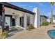 This house features an inviting outdoor space, including a patio area with a grill and a relaxing pool at 6401 E Voltaire Ave, Scottsdale, AZ 85254