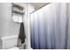 Bathroom with a shower-tub combination and a towel rack above the toilet at 6401 E Voltaire Ave, Scottsdale, AZ 85254