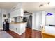 Well-appointed kitchen features stainless steel appliances, hardwood floors, and ample counter space at 6401 E Voltaire Ave, Scottsdale, AZ 85254