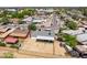 An aerial view of the home features a large backyard, covered patio, and privacy fence at 6501 W Columbus Ave, Phoenix, AZ 85033