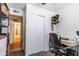 Bright bedroom featuring an organized desk space, a neutral color palette, and a comfortable chair at 6501 W Columbus Ave, Phoenix, AZ 85033