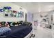 Spacious room with a twin bed and comfortable furnishings, with connecting second bed at 6701 W Catalina Dr, Phoenix, AZ 85033
