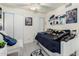 Comfortable bedroom with twin bed and sliding closet, perfect for Gathering living at 6701 W Catalina Dr, Phoenix, AZ 85033