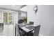 Cozy dining area with modern decor and natural light from the sliding glass door at 6701 W Catalina Dr, Phoenix, AZ 85033