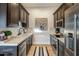 Elegant kitchen with white countertops, modern appliances and a stylish runner rug at 7327 E La Junta Rd, Scottsdale, AZ 85255