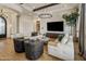 Beautifully decorated living room featuring a large television and comfortable seating at 7327 E La Junta Rd, Scottsdale, AZ 85255