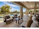 Spacious outdoor patio with comfortable seating and stunning pool view at 7327 E La Junta Rd, Scottsdale, AZ 85255