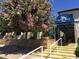 Resort entrance with stunning foliage and manicured landscaping, creating a welcoming arrival at 7750 E Broadway Rd # 774, Mesa, AZ 85208
