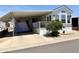 Inviting manufactured home with a covered carport and neat landscaping, offering a cozy curb appeal at 7750 E Broadway Rd # 774, Mesa, AZ 85208