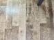 Close-up of the stylish and durable wood-look plank flooring throughout the home at 7750 E Broadway Rd # 774, Mesa, AZ 85208