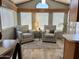Cozy living room featuring comfortable seating, a bright window, and stylish decor at 7750 E Broadway Rd # 774, Mesa, AZ 85208