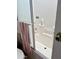 Bright shower stall featuring built-in shelving and a sleek glass door at 7750 E Broadway Rd # 774, Mesa, AZ 85208
