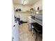 Utility room features shelving, washer/dryer hookups, and room for storage at 7750 E Broadway Rd # 774, Mesa, AZ 85208