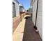 Exterior view of walkway between properties with brick pavers and privacy wall at 7750 E Broadway Rd # 774, Mesa, AZ 85208