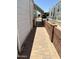 Cozy walkway with pavers and a secure gate, connecting to the carport area at 7750 E Broadway Rd # 774, Mesa, AZ 85208