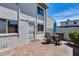 Private patio featuring an outdoor dining set and a small garden area at 8225 N Central Ave # 44, Phoenix, AZ 85020