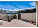 Private patio featuring an outdoor dining set, a small garden, and a covered area at 8225 N Central Ave # 44, Phoenix, AZ 85020