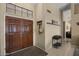 Welcoming entryway with double doors, neutral tones and decorative accents at 843 E Vera Ln, Tempe, AZ 85284