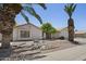 Charming single-story home featuring desert landscaping and a welcoming facade on a sunny day at 843 E Vera Ln, Tempe, AZ 85284
