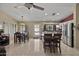 Well-lit eat-in kitchen featuring granite countertops, stainless steel appliances and tiled floors at 843 E Vera Ln, Tempe, AZ 85284