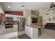 Well-equipped kitchen seamlessly flowing into the living area, perfect for entertaining guests at 843 E Vera Ln, Tempe, AZ 85284
