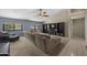 Bright living room featuring a large sectional sofa, TV and neutral color palette at 843 E Vera Ln, Tempe, AZ 85284