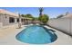 Inviting backyard featuring a sparkling pool, patio area, and privacy fencing perfect for outdoor enjoyment at 843 E Vera Ln, Tempe, AZ 85284