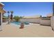 Private backyard pool featuring concrete patio and block wall for seclusion at 843 E Vera Ln, Tempe, AZ 85284