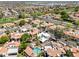 Beautiful aerial view showcases community homes, lush landscaping and nearby golf course at 8844 S 51St St # 3, Phoenix, AZ 85044