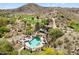 Scenic aerial view of a pool area nestled beside a desert golf course with mountain backdrop at 8844 S 51St St # 3, Phoenix, AZ 85044