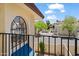 Balcony with iron railings providing views of the neighborhood and blue awning at 8844 S 51St St # 3, Phoenix, AZ 85044